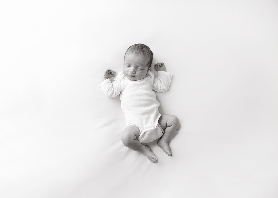 Black and white baby portrait by Mebane Portrait Studio